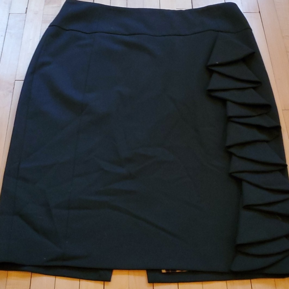Black pencil skirt with ruffled side.